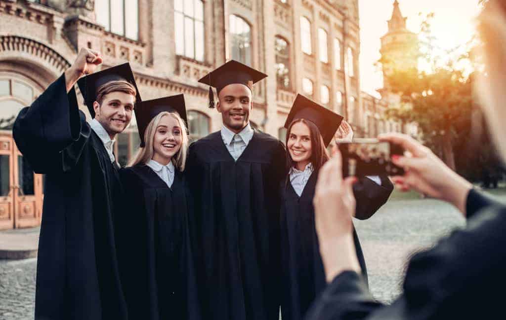college students posing for graduation picture