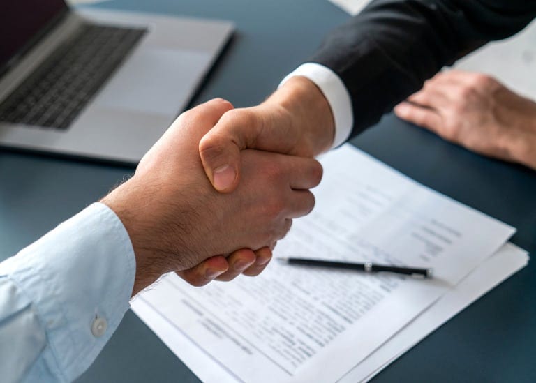 people shaking hands