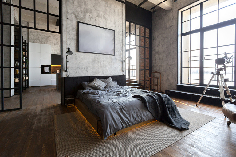 example of a loft apartment high ceilings and large windows