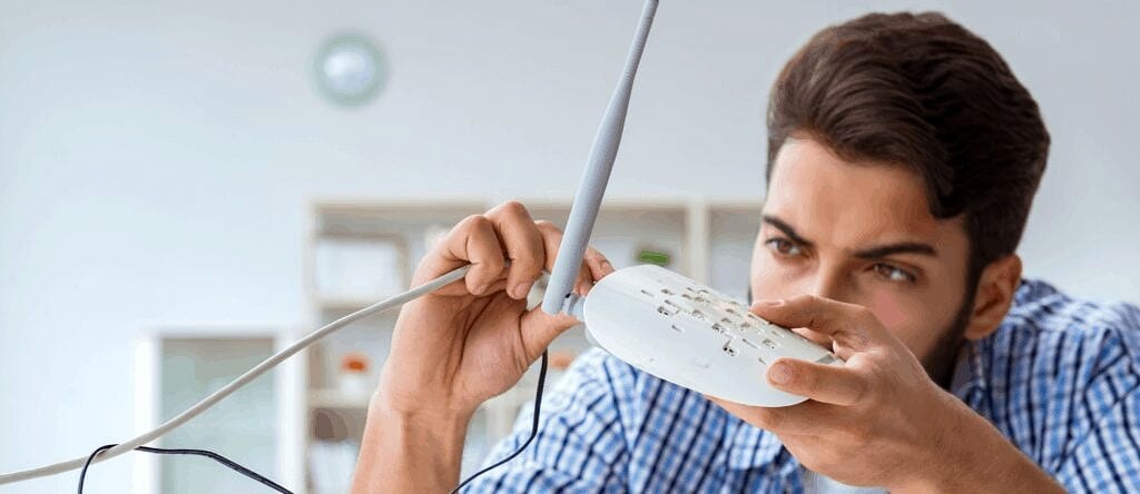 person trying to fix wifi
