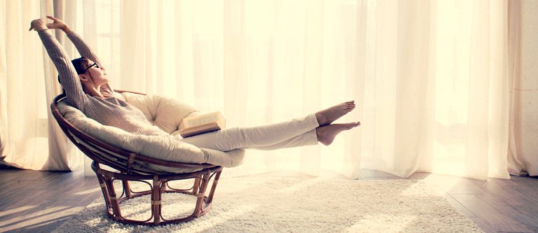 woman stretching out in 2,000 square foot apartment