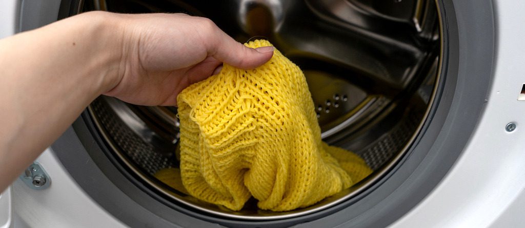 Wool sweater in a dryer.